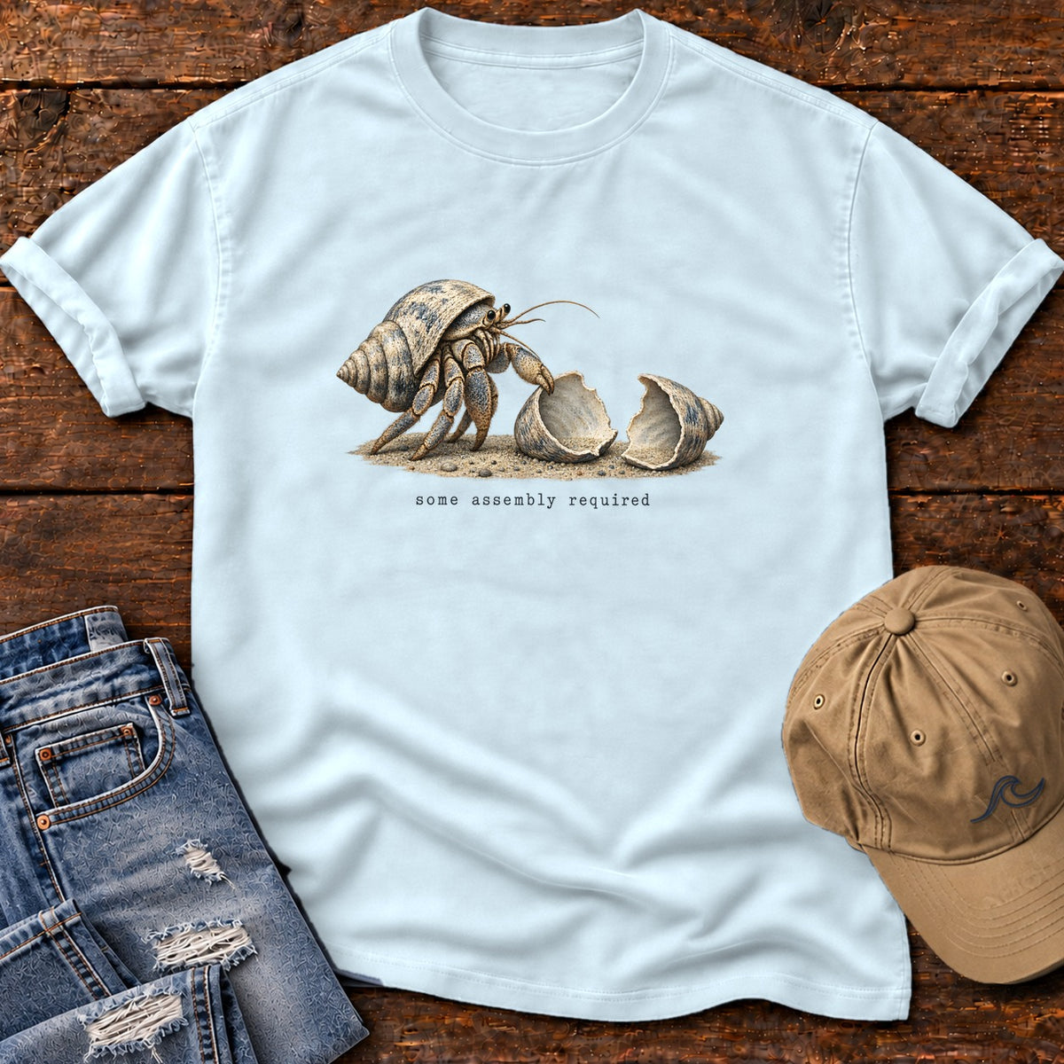 Some Assembly Required Hermit Crab T-Shirt Comfort Colors in Chambray, Salty Paws Comfort Colors T-Shirt, front design flat lay
