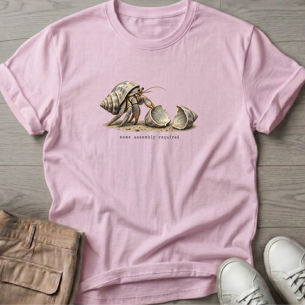 Some Assembly Required Hermit Crab T-Shirt in Light Pink, Salty Paws Soft Style T-Shirt, front design flat lay