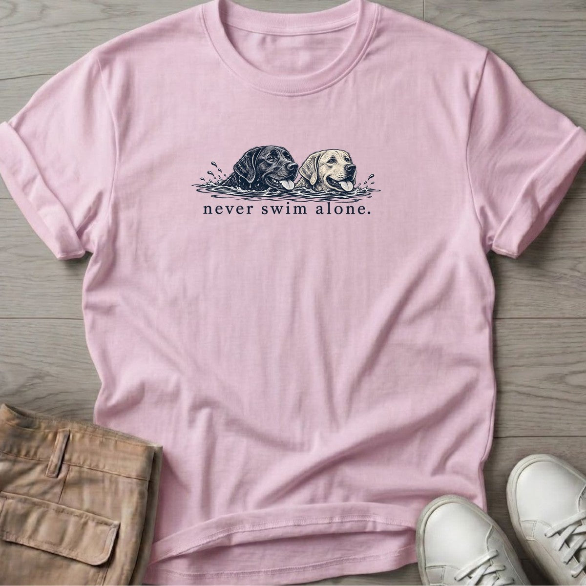 Two Labs Never Swim Alone T-Shirt in Light Pink, Salty Paws T-Shirt, front design flat lay