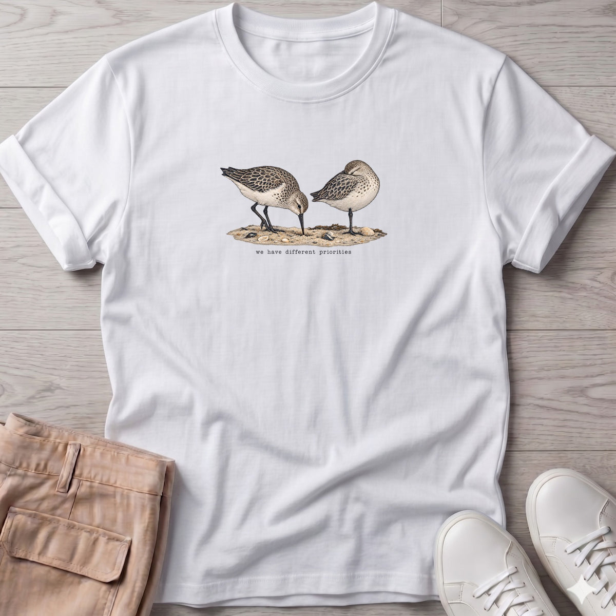 We Have Different Priorities Sandpipers T-Shirt in White, Salty Paws Soft Style T-Shirt, front design flat lay